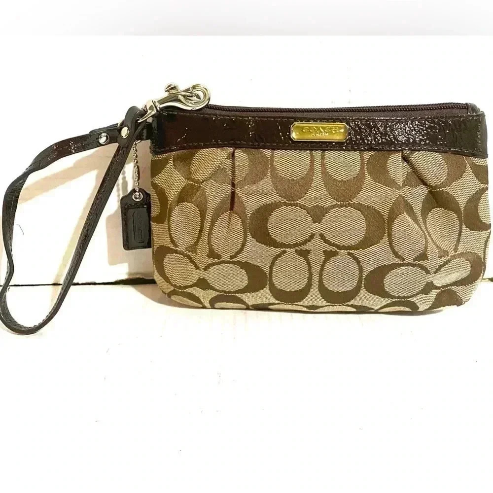 Coach CC signature print canvas wristlet